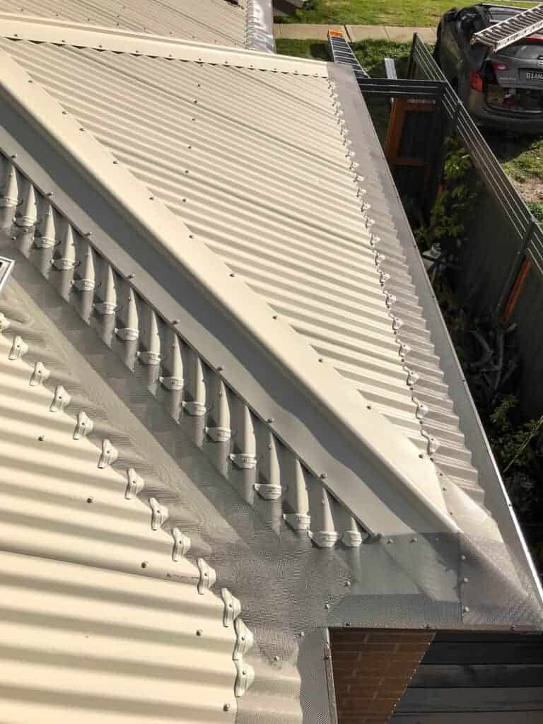 How to Install Gutter Guards on a Metal Roof - DIY Gutter Guard