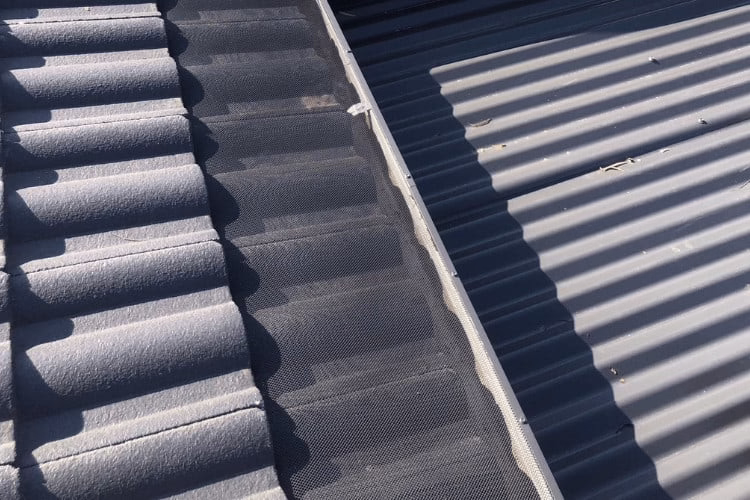 tile gutter guard system