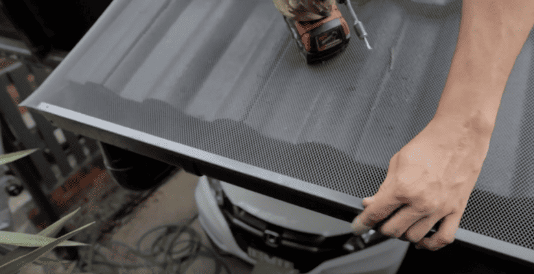 Secure the mesh to gutter with trims