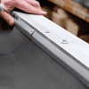 Secure the mesh with trims