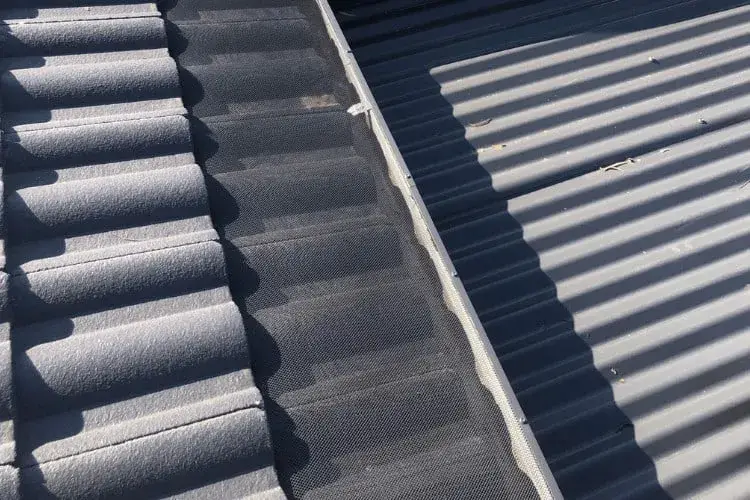 tile gutter guard system