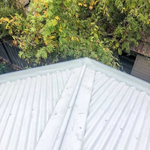 corrugated roof gutter guard system