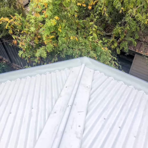 corrugated roof gutter guard system
